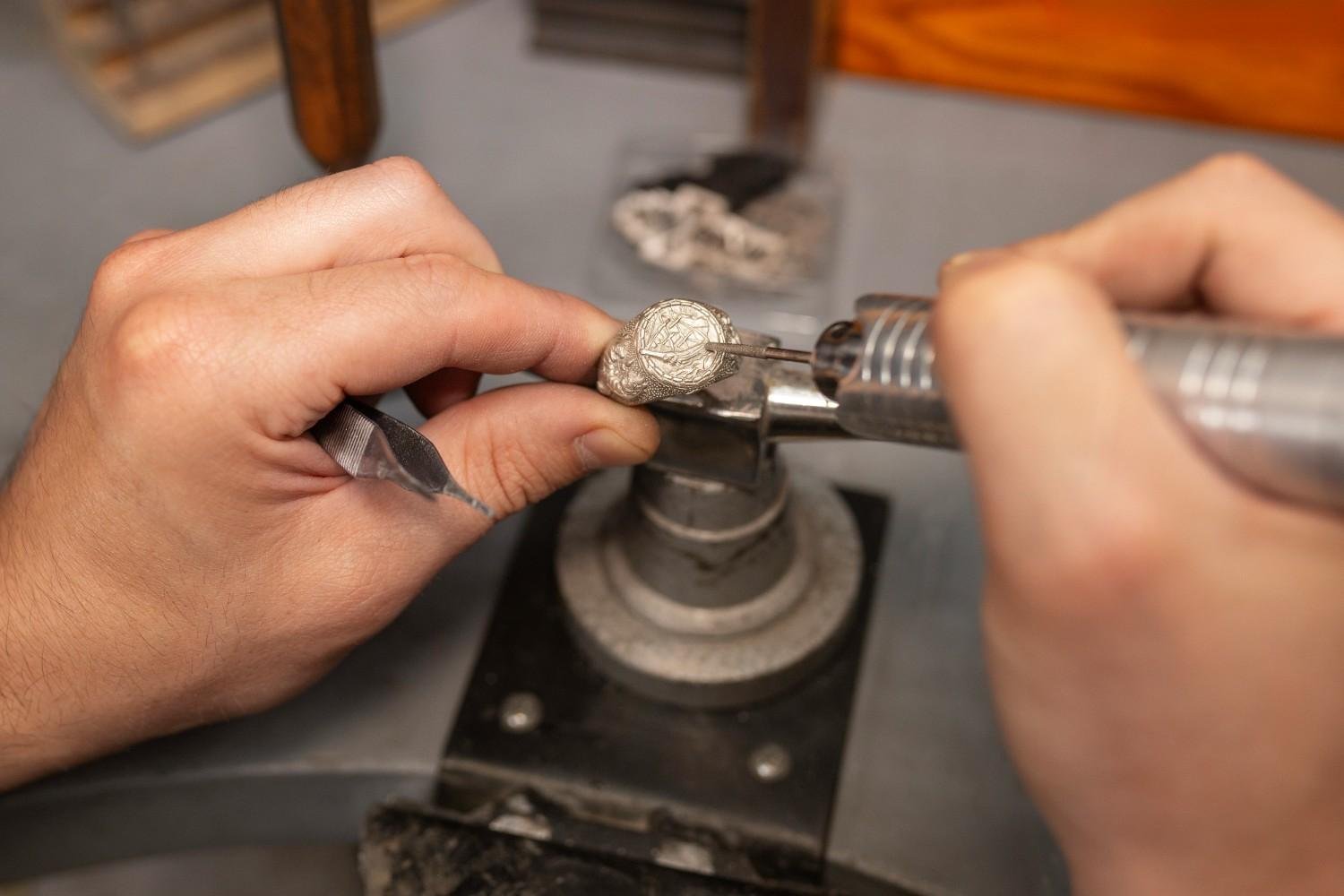 51ba570fe68fc088e0a942bdf8700cdce7eb8b1d/1755498091jeweler-s-hands-making-jewellery-1.jpg